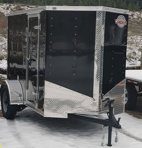 Equipment tranportation to ski hills is no problem with our handy enclosed cargo trailer.