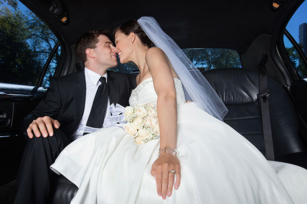 A limousine ride adds happiness and a hint of luxury to any wedding!